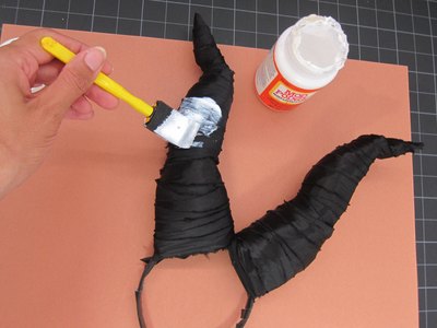 Brush layers of Mod Podge on the horns.