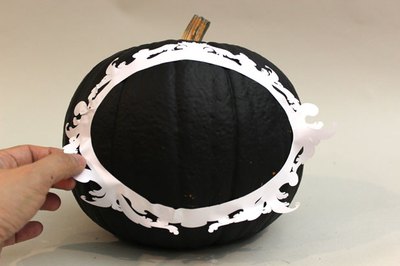 Place a vinyl decal frame on the pumpkin