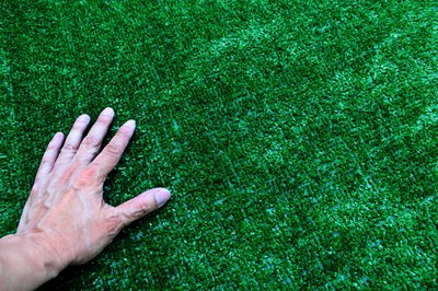 Rub the grass down on the mat