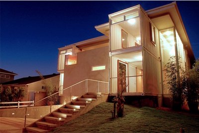 Part of this chic home is a recycled steel shipping container.