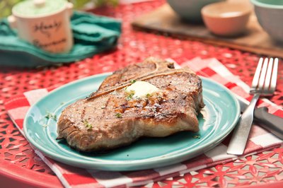 T-Bone steak on plate.