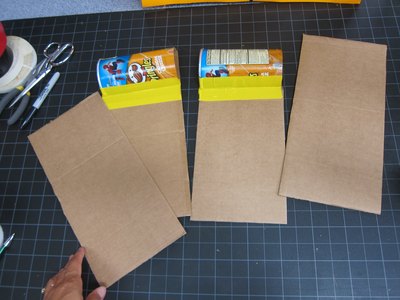 Cut two more pieces of cardboard.