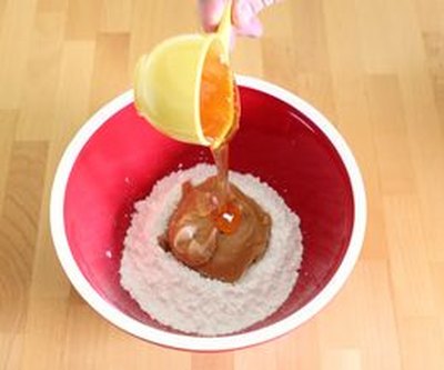 Combine powdered sugar, peanut butter and honey in your bowl.