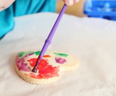 Apply the edible paint to plain sugar cookies for a colorful sweet treat.