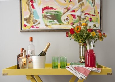 Fresh flowers add an element of grace to a cocktail area.