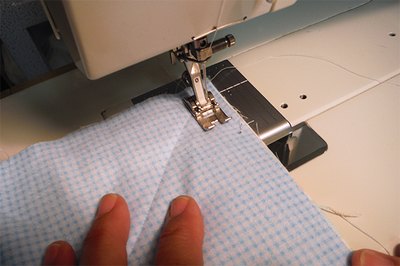 Sew corner to corner, along marked lines.