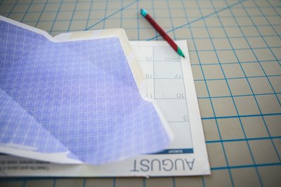 Trace your envelope on the back of the calendar page.