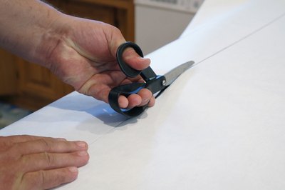 Cut the film to size.