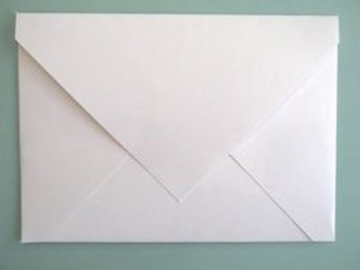 Use a glue stick to seal the envelope.