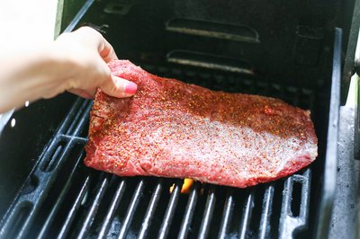 Skirt steak on grill.