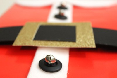 Glue the buttons to the placket.