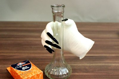 fake hand tutorial using wire, batting, hot glue, and rubber gloves for  Halloween