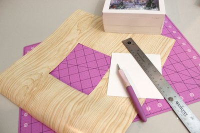 Cut an opening in the wrapping paper.