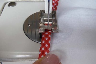 Stitch the binding closed.