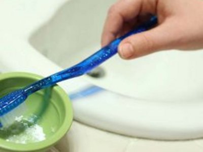 The baking soda should stick to your toothbrush right away.