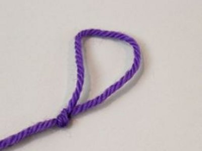 Tie a loop in the middle of the string