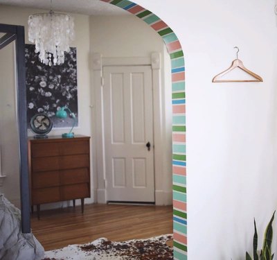 Washi tape adds color to an otherwise bland archway.