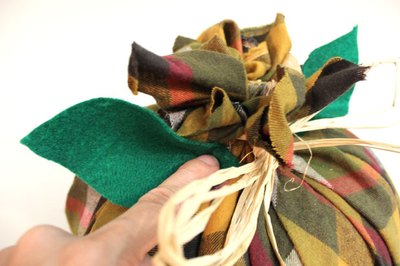 Glue felt leaves to the top