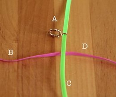 Form a cross with your laces.