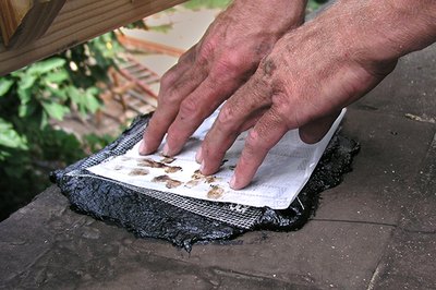 Carefully push the patch into place.