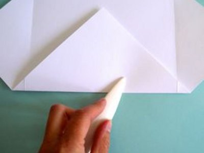 Use a bone folder to crease edges.