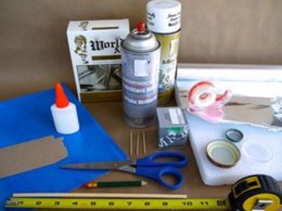 Make a model satellite from recycled materials.