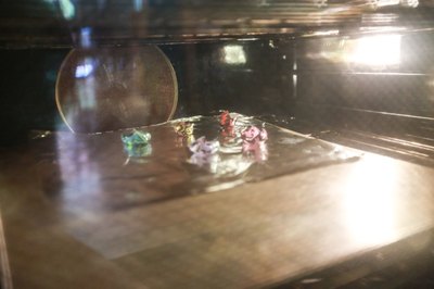 Don't worry if they warp! Leave the Shrinky Dinks in the oven until they let flat again.