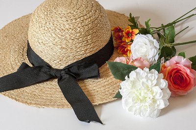 Start with a straw hat that has a wide brim