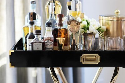 An inexpensive restaurant stand in a coordinating color can give your tray total versatility.