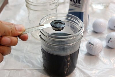 Fill a jar with water and liquid dye
