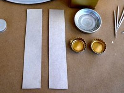 Spray paint caps, toothpicks and cardboard.