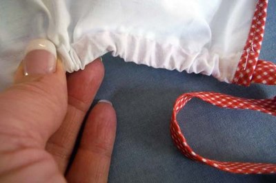 Thread the straps through the casing.