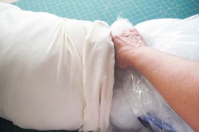 Stuff the pillow with fiber fill.