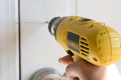 Hold the drill in straight alignment.