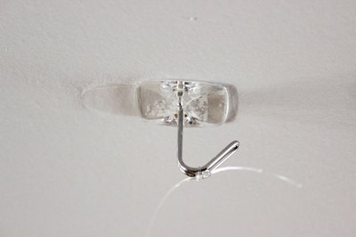 Place two hooks on the ceiling