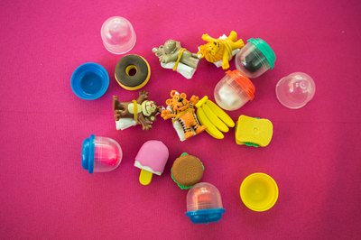 Gather all your trinkets and decide what to include on your necklace.