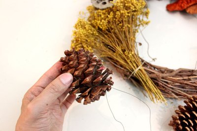 Attach pine cones