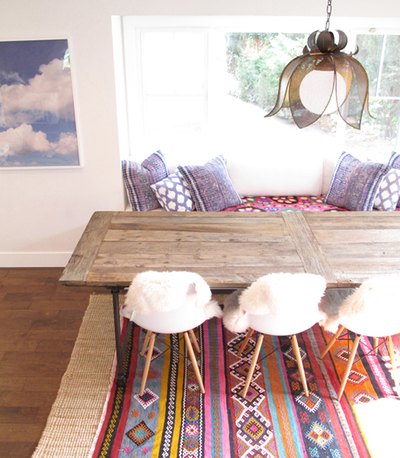 Choose rugs with interesting colors or textures to enhance the indoor view.