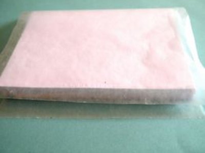 Place the pages between wax paper.