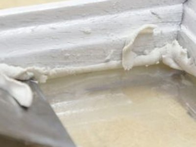 Clean bedding compound from inside surface.
