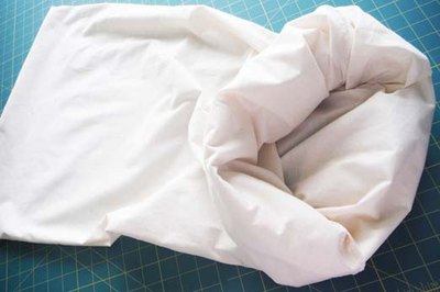 Unroll as you stuff the pillow.