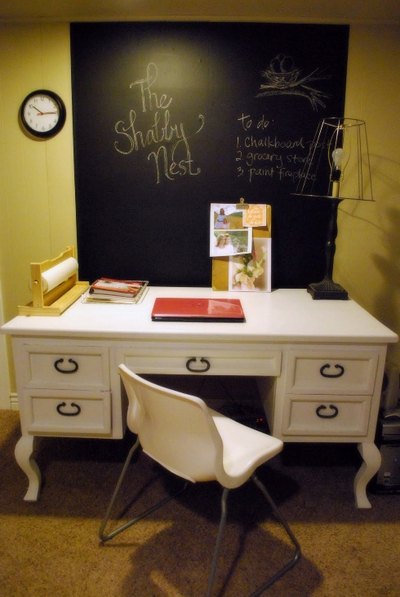 Create a chalkboard wall without paint by using a special adhesive vinyl.