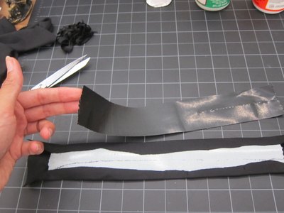 Cover a piece of duct tape with fabric.