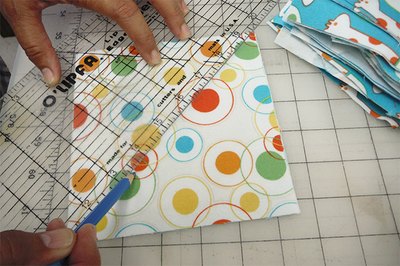 Mark an X on each the front of each assembled square.