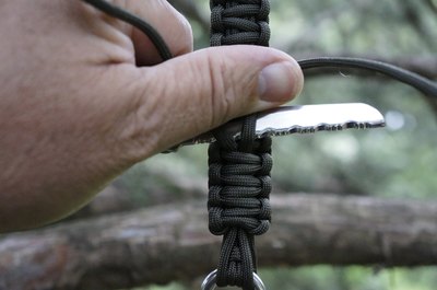 Cut close to the weave, but avoid cutting it.