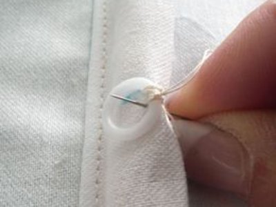 Sew the rings in place.