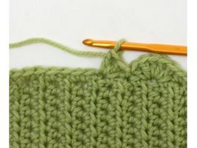 Crochet the scallop edge and loop.