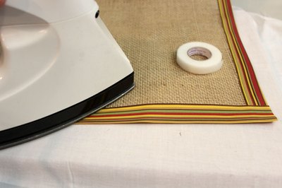 Cover edges with ribbon
