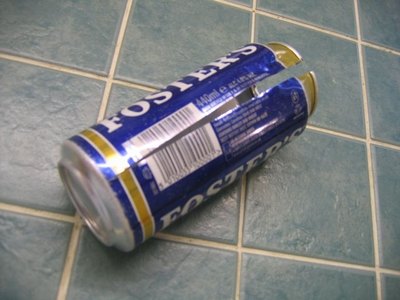 Cut down the side of the can