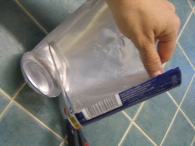 Cut away the bottom of the can